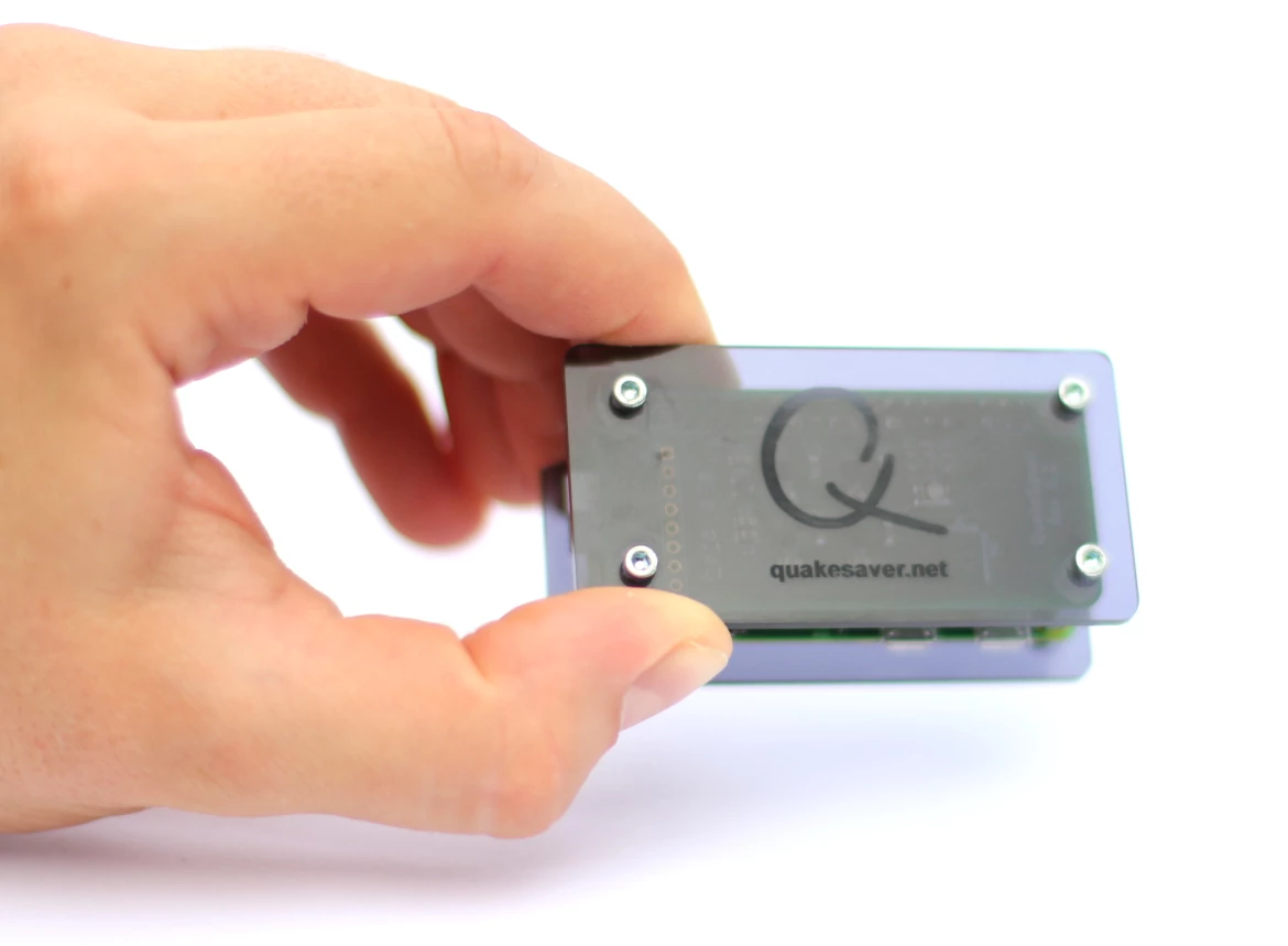 SeismiQ seismic sensor held in hand